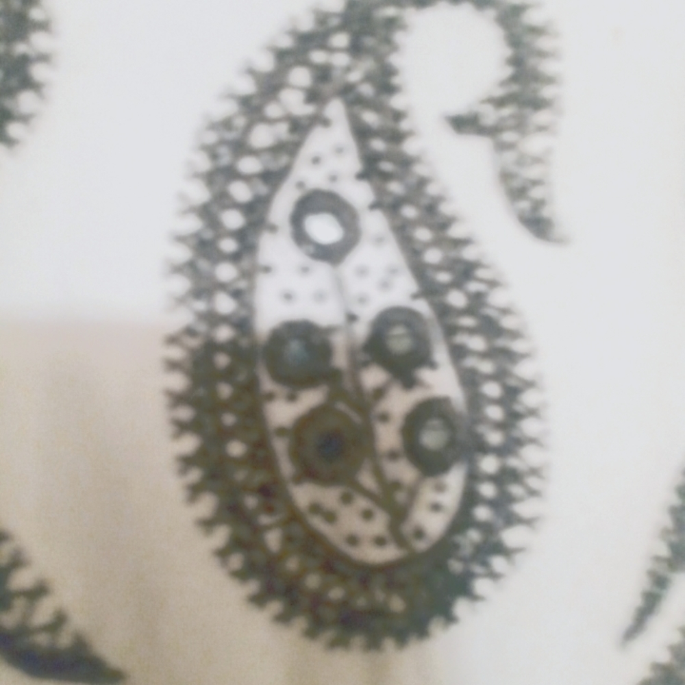 Dress above the knee a line White in color w bead work